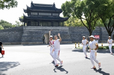 笑颜与周到刷屏！这名火炬手是918博天堂人！